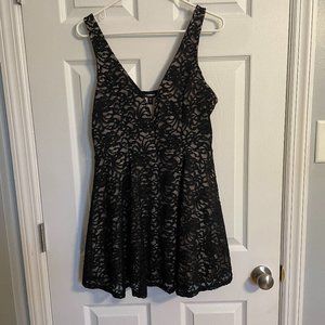 Low Cut Black and Tan Mini Romper